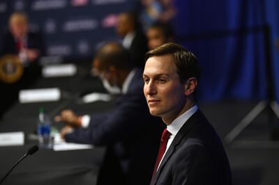 Senior Advisor to the President Jared Kushner looks on as US President Donald Trump pariticpates in a roundtable with African American leaders at the Ford Rawsonville Plant in Ypsilanti, Michigan on May 21, 2020.  / AFP / Brendan Smialowski
