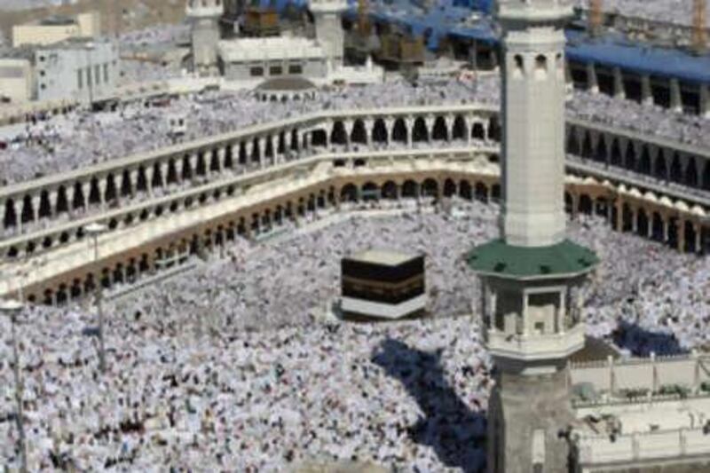 Tens of thousands of haj pilgrims attend the Friday prayers inside, and outside the Grande Mosque in Mecca on Dec 5 2008.