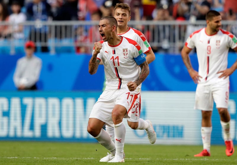 Kolarov celebrates scoring the opening goal. Mark Baker / AP Photo