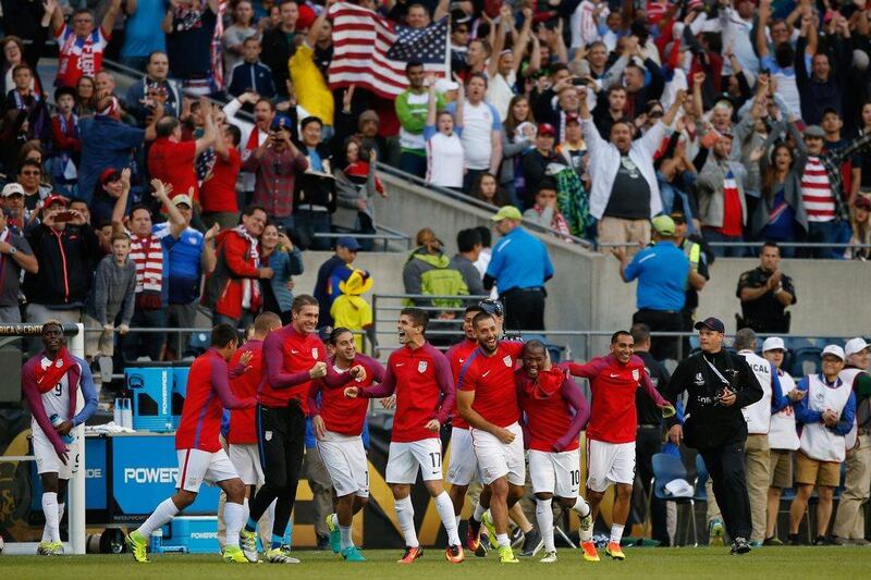 Members of the United States celebrate after defeating Ecuador 2-1 in the 2016 Quarterfinal - Copa America Centenario match at CenturyLink Field on June 16, 2016 in Seattle, Washington. Otto Greule Jr/Getty Images/AFP