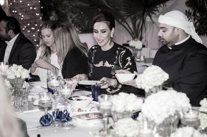 At a recent high-society gathering put together by Club Uno Dubai, 24 people with fashion industry influence gathered in the designer Nadine Kanso’s Jumeirah Beach Road garden for an exclusive dinner. Courtesy Club Uni Di Peroni 