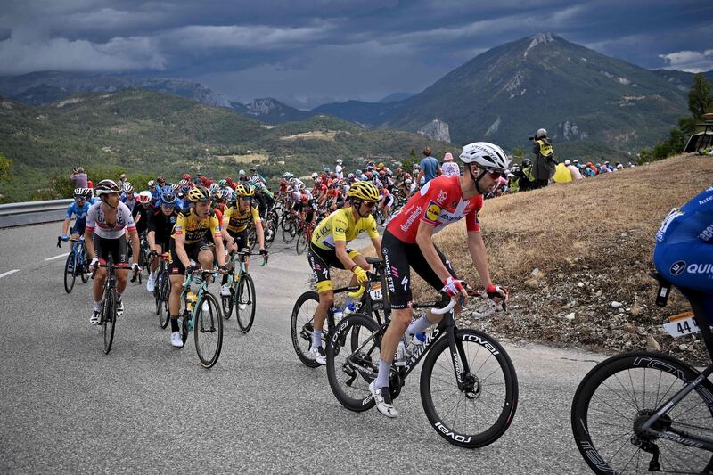 Yellow jersey holder Julian Alaphilippe with the peolton on Stage 3. AFP