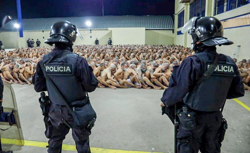 Gang members are secured during a police operation at Izalco jail during a 24-hour lockdown ordered by El Salvador's President Nayib Bukele in Izalco, El Salvador. Reuters