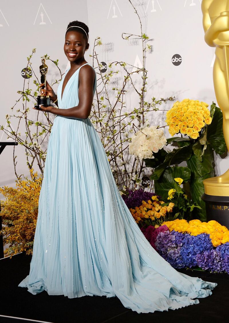 HOLLYWOOD, CA - MARCH 02: Actress Lupita Nyong'o poses in the press room during the Oscars at Loews Hollywood Hotel on March 2, 2014 in Hollywood, California.   Jason Merritt/Getty Images/AFP