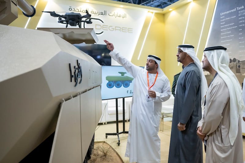 President Sheikh Mohamed views a vehicle at Idex