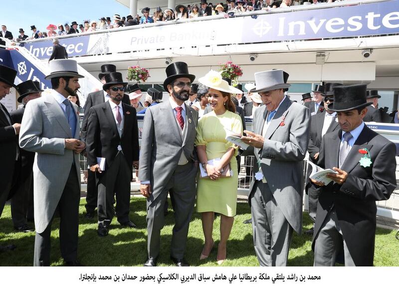 Sheikh Mohammed bin Rashid, Vice President and Ruler of Dubai, Sheikh Hamdan bin Mohammed, Crown Prince of Dubai, and Princess Haya bint Al Hussein, wife of Sheikh Mohammed, attend the Investec Derby Festival at the Epsom Downs Racecourse on Saturday. Wam