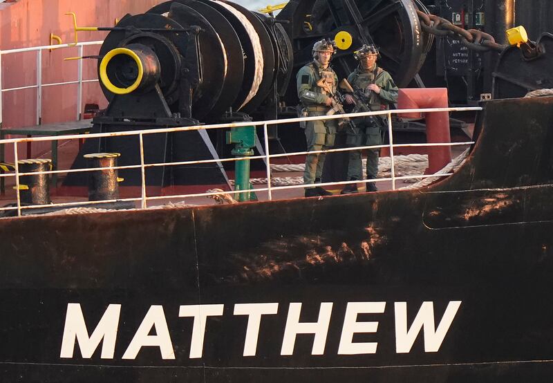 Military personnel onboard a cargo vessel named MV Matthew whilst it's escorted into Cobh in Cork by the Irish Navy after a "significant quantity" of suspected drugs were found onboard. Three men have been arrested on suspicion of organised crime offences. Tuesday September 26, 2023. PA