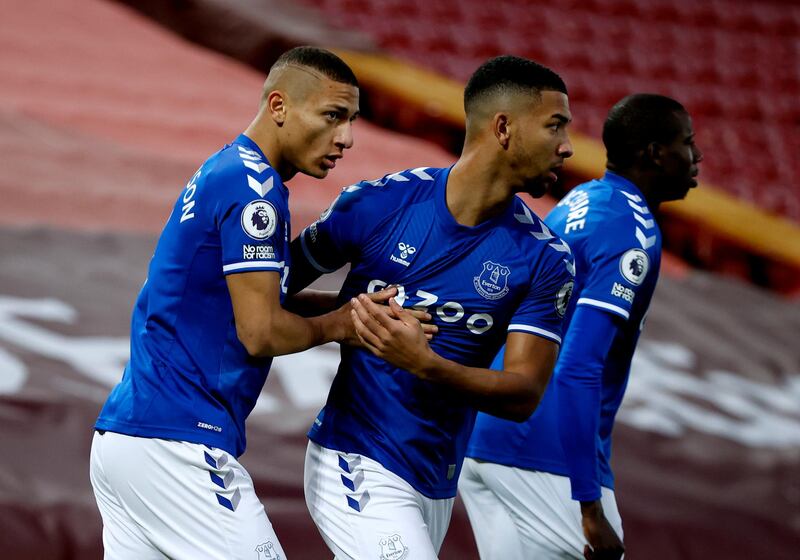 Everton's Richarlison (left) celebrates with his team-mates after scoring the first goal. PA