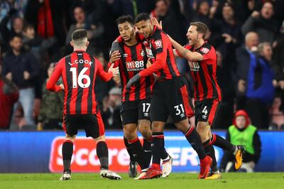 BOURNEMOUTH, ENGLAND - FEBRUARY 03: Joshua King of AFC Bournemouth celebrates scoring his side's first goal with team mates during the Premier League match between AFC Bournemouth and Stoke City at Vitality Stadium on February 3, 2018 in Bournemouth, England.  (Photo by Warren Little/Getty Images)