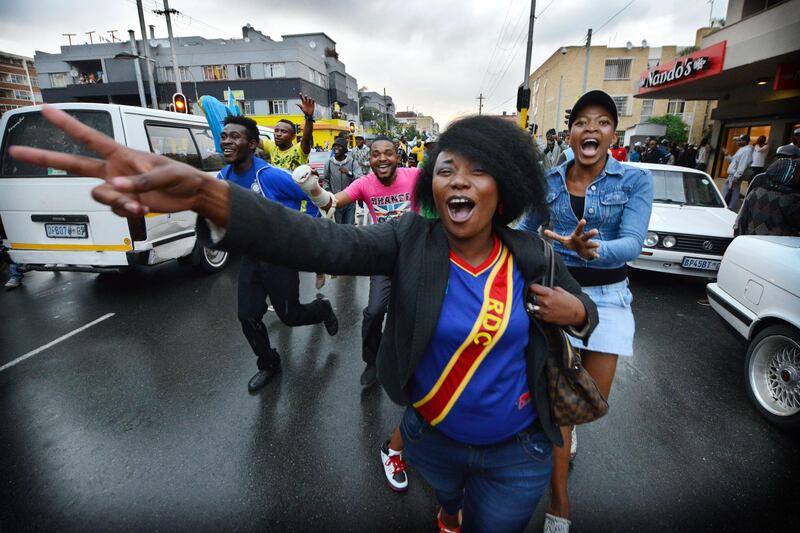 NOT FOR RESALE
JOHANNESBURG - 20130120 - Congo supporters celebrate a 2-2 comeback after the final whistle of the Afcon match Congo-Ghana in Yeoville, Johannesburg.
Photo: Bram Lammers 
NOT FOR RESALE.
COPYRIGHT BRAM LAMMERS PHOTOGRAPHY
