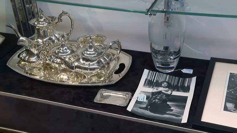A silver coffee and tea set and a signed photo of an opera singer were also part of the April auction. AP