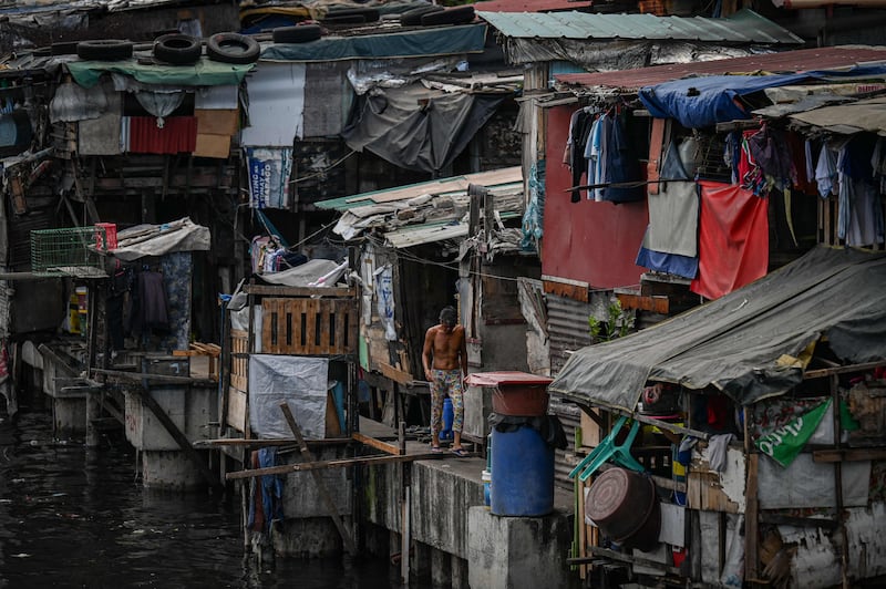 Makeshift homes are crammed together in Manila. AFP