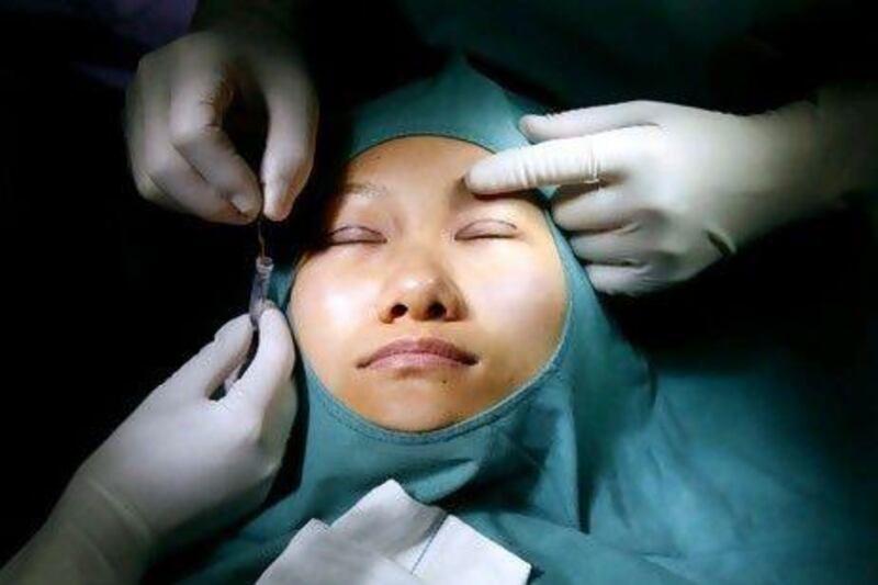 Plastic surgery clinics have reported a surge in demand during the Covid-19 pandemic.  Nir Elias / Reuters