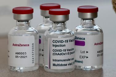 FILE - In this file photo dated Friday, Feb. 5, 2021, vials AstraZeneca vaccine ready to be used at the Wellcome Centre in London. Regulators in the U.K. and four other countries said Thursday March 4, 2021, they plan to fast-track the development and authorisation of modified COVID-19 vaccines to ensure drugmakers are able to move swiftly in targeting emerging variants of the coronavirus disease. (AP Photo/Frank Augstein, FILE)