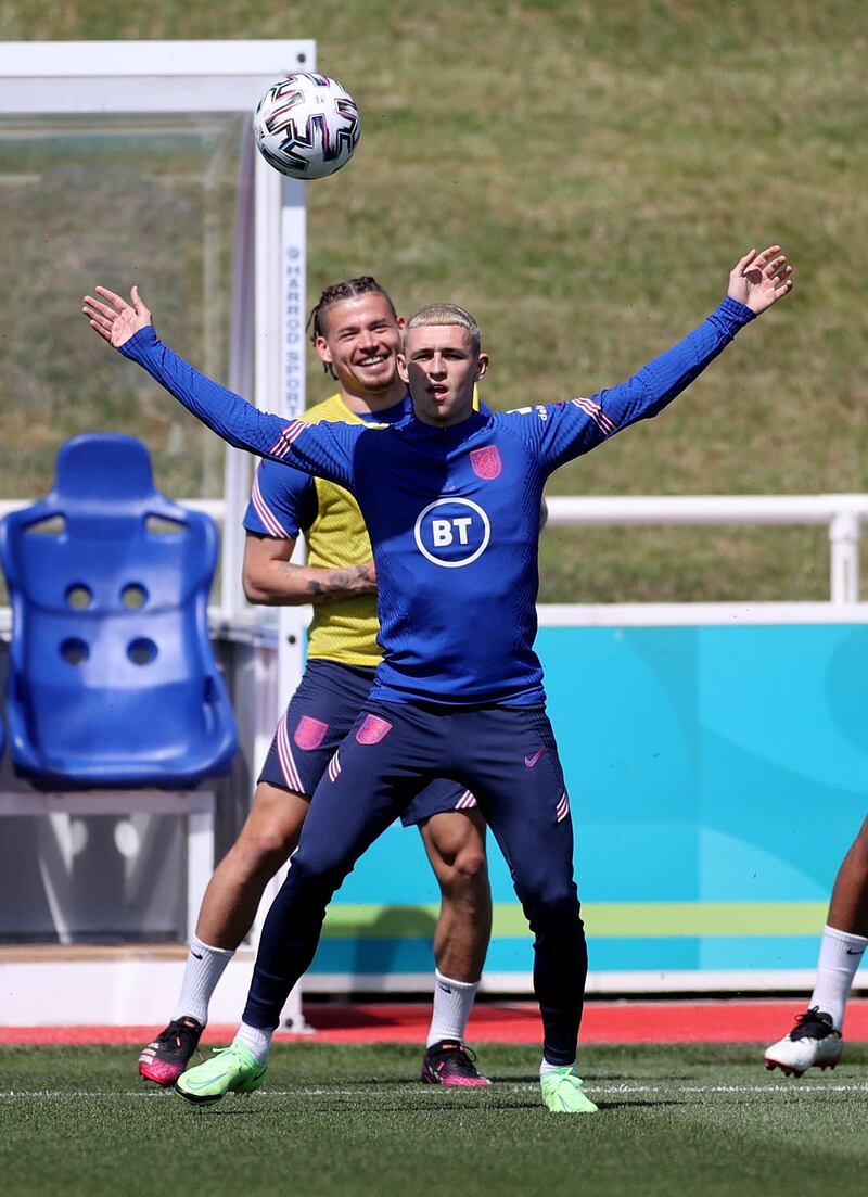 England's Phil Foden, front, and Kalvin Phillips. Reuters