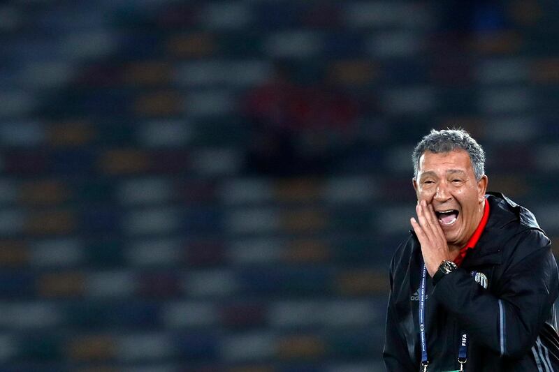 Al Jazira's head coach Henk Ten Cate gives directions to his players during the Club World Cup soccer match between Al Jazira Club and Urawa Reds at Zayed sport city in Abu Dhabi, United Arab Emirates, Saturday, Dec. 9, 2017. (AP Photo/Hassan Ammar)