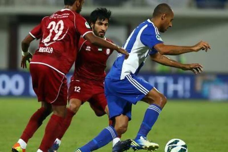 Serbian Bruno Correa, right, remains popular among Al Nasr fans after he scored 19 goals during 32 matches in his debut season. Satish Kumar / The National