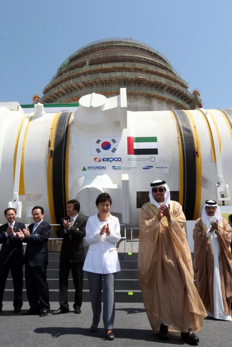 Sheikh Mansour bin Zayed, Deputy Prime Minister and Minister of Presidential Affairs, and South Korean’s president Park Geun-hye at the ceremony to install the Korean-built nuclear reactor in Barakah on May 20, 2014. Yonhapnews / EPA