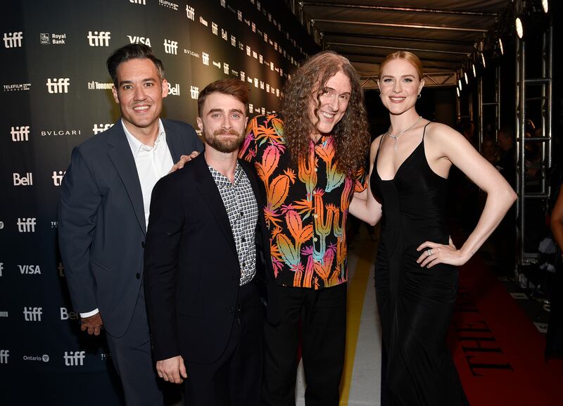 From left, director Eric Appel, Daniel Radcliffe, 'Weird Al' Yankovic and Evan Rachel Wood at the premiere for 'Weird: The Al Yankovic Story', which was the Midnight Madness winner. AP