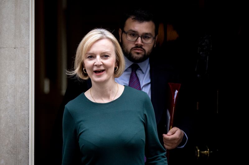 Britain's Prime Minister Liz Truss leaves 10 Downing Street to appear at Prime Minister's Questions in parliament on Wednesday. EPA