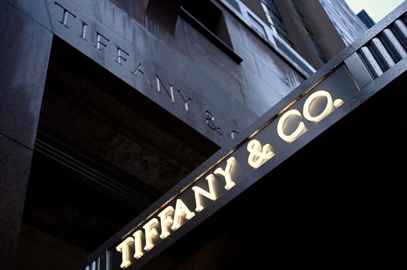 (FILES) In this file photo the logo of luxury jewelry and specialty retailer Tiffany & Co is seen on 5th Avenue in Manhattan on October 27, 2019  in New York City.  Shares of Tiffany were under pressure for a second straight session Wednesday following a report that its deal to be acquired by LVMH may be coming apart. Tiffany's stock was down 0.6 percent in mid-morning trading at $116.32 after shares dropped nine percent on June 3, 2020. Fashion publication Women's Wear Daily reported that the French luxury giant was reevaluating the $16.2 billion Tiffany acquisition previously seen as worthy investment to bolster the company's US presence.
 / AFP / Johannes EISELE
