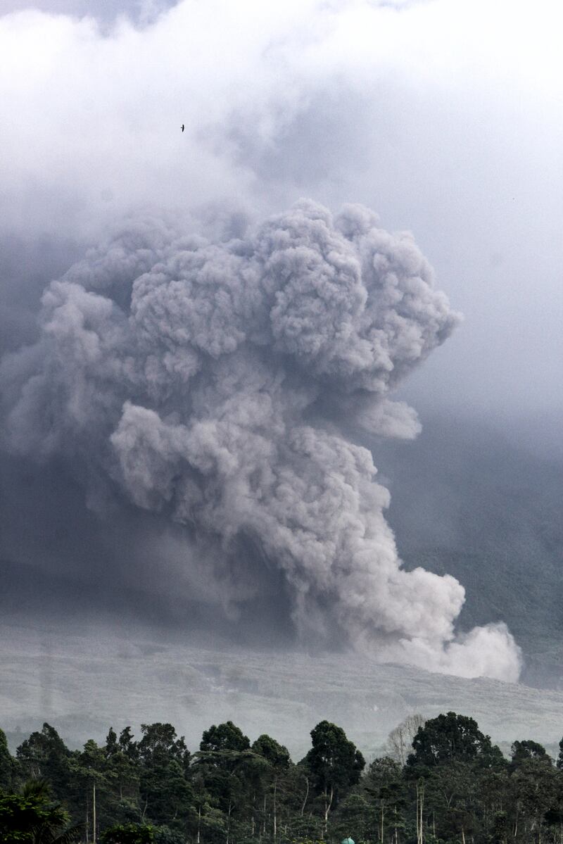 Mount Semeru spews volcanic materials to the air. EPA