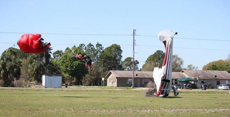 The nose of the plane crumples as it hits the ground. Amazingly, both the pilot and the parachutist suffered only minor injuries. Tim Telford / AP Photo / March 8, 2014
