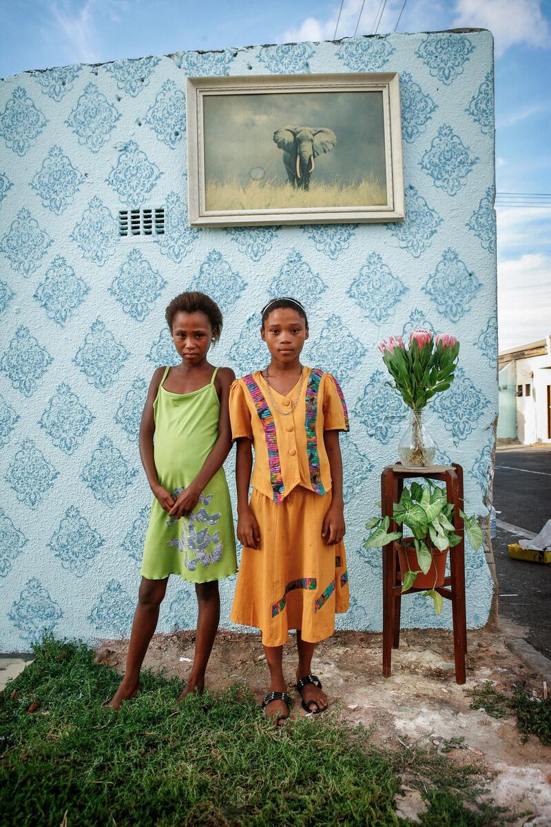 Alexia Webster: Two friends, names not given, posing for their portrait on the corner of Cornwell and Hercules Street in Woodstock, Cape Town, South Africa, 2011. From the series StreetStudios, 2011–2018 © Alexia Webster, Prix Pictet