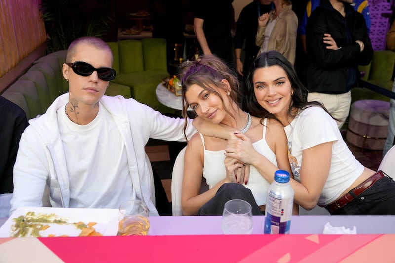 Justin Bieber with wife Hailey Bieber and friend Kendall Jenner attends Super Bowl LVI. Getty Images