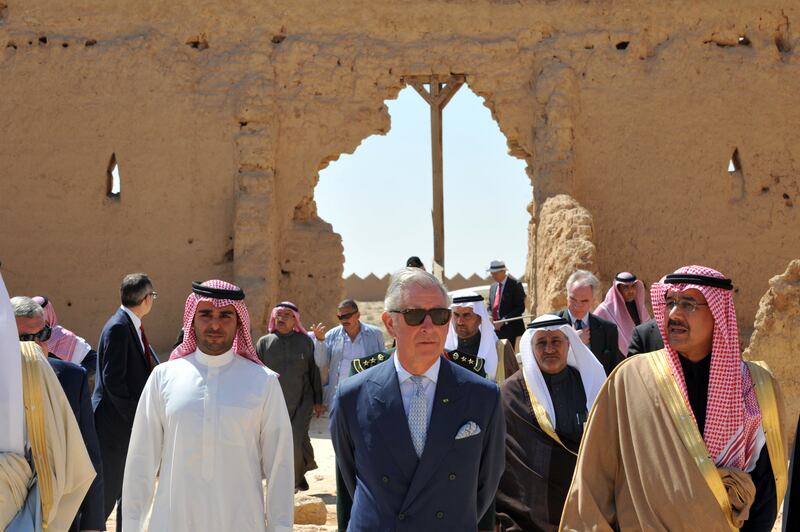 Britain's Prince Charles (C) visits an historical site under reconstruction at the old city of al-Diriyah, on the northwestern outskirts of Riyadh, Saudi Arabia, 19 February 2014. EPA