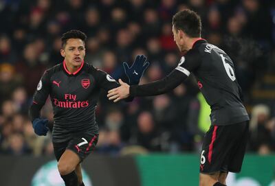 LONDON, ENGLAND - DECEMBER 28: Alexis Sanchez of Arsenal celebrates with Laurent Koscielny of Arsenal during the Premier League match between Crystal Palace and Arsenal at Selhurst Park on December 28, 2017 in London, England. (Photo by Catherine Ivill/Getty Images)