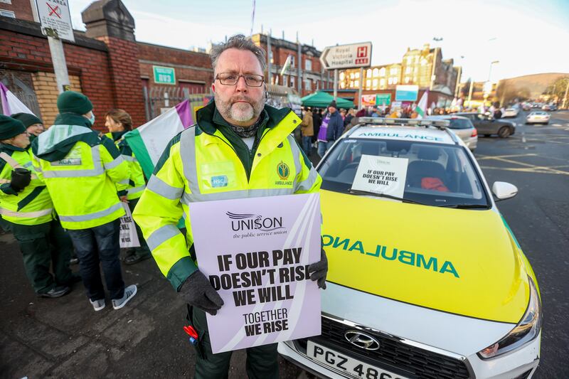 Paramedic Gabriel McComish, on the picket line outside the Royal Victoria Hospital in Belfast, as thousands of health and social care workers in Northern Ireland take part in strike action. PA
