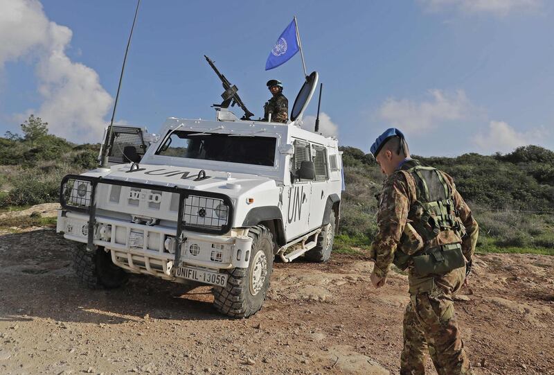 Soldiers form the Italian contingent in the UNIFIL patrol the blue line in Lebanon's southern border town of Naqura on the border with Israel, south of Beirut, on February 24, 2018.
The UN peacekeeping force in southern Lebanon has made efforts to prevent tension between Lebanon and Israel from escalating into a conflict, warning of continued escalation on the backdrop of oil exploration and construction of a barrier on the border. / AFP PHOTO / JOSEPH EID