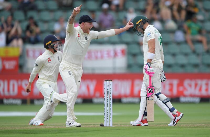 England fielder Ollie Pope, left, celebrates with Ben Stokes after catching out Faf du Plessis off the bowling of Dom Bess. Getty