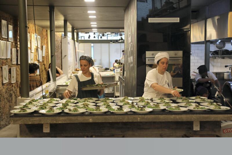 Chefs at the restaurant prepare dishes, credit Peter Yeung.jpg