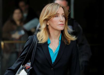 FILE PHOTO: Actor Felicity Huffman, facing charges in a nationwide college admissions cheating scheme, leaves federal court in Boston, Massachusetts, U.S., April 3, 2019.  REUTERS/Brian Snyder/File Photo