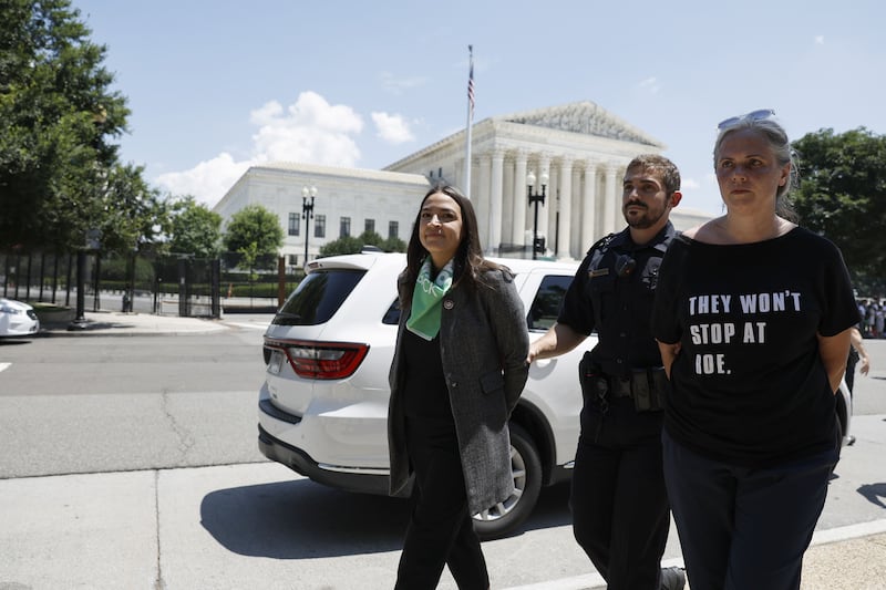 Alexandria Ocasio-Cortez is detained by police. AFP