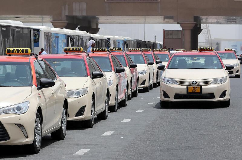 DUBAI , UNITED ARAB EMIRATES , JULY 5 – 2018 :- Dubai RTA taxi waiting for the customers near the Ibn Battuta metro station in Dubai. ( Pawan Singh / The National )  For Stock
