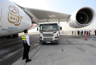The fuel lorry approaches the plane at Dubai International Airport on Wednesday. Chris Whiteoak / The National