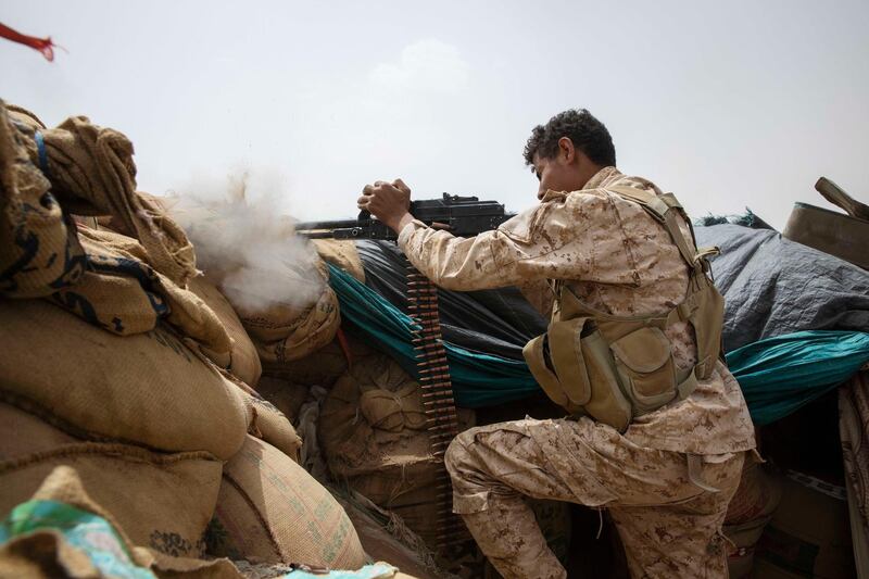 A Yemeni fighter in Marib fires at Houthi forces trying to seize control of the oil-rich province. AP
