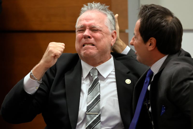 Scot Peterson, a former security guard at the Marjory Stoneman Douglas High School, celebrates after his acquittal. AP