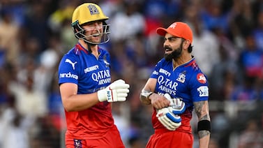 Royal Challengers Bengaluru's Virat Kohli and Will Jacks (L) celebrate their team's win in the Indian Premier League (IPL) Twenty20 cricket match between Gujarat Titans and Royal Challengers Bengaluru at the Narendra Modi Stadium in Ahmedabad on April 28, 2024.  (Photo by Punit PARANJPE  /  AFP)  /  -- IMAGE RESTRICTED TO EDITORIAL USE - STRICTLY NO COMMERCIAL USE --
