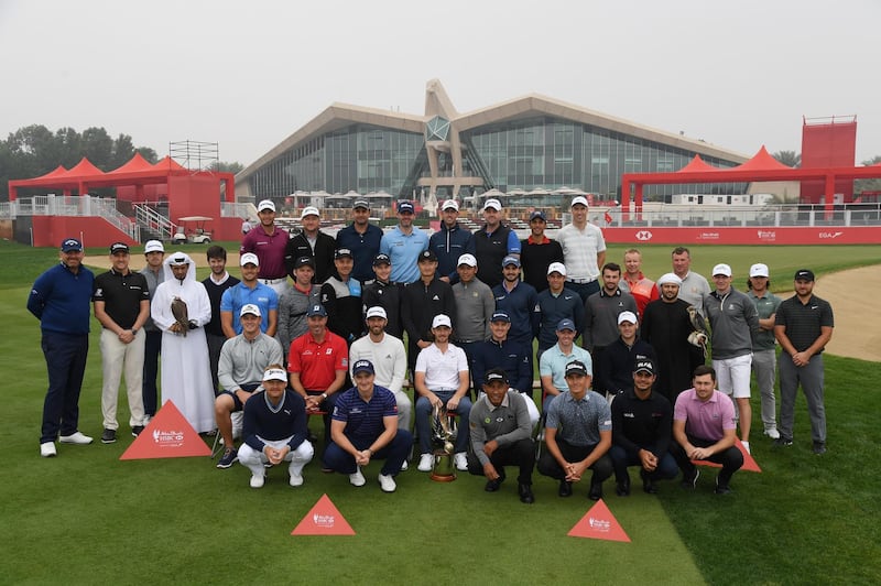 Players and officials pose  for photos ahead of the Abu Dhabi HSBC Championship. Ross Kinnaird / Getty Images