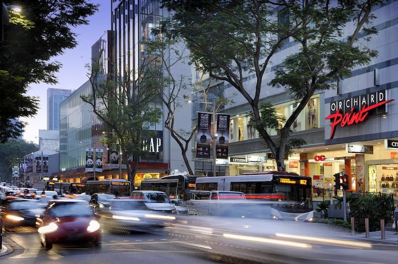 Traffic at Orchard Road during evening rush hour in Singapore. The country aims to phase out combustion car sales by 2030. Bloomberg
