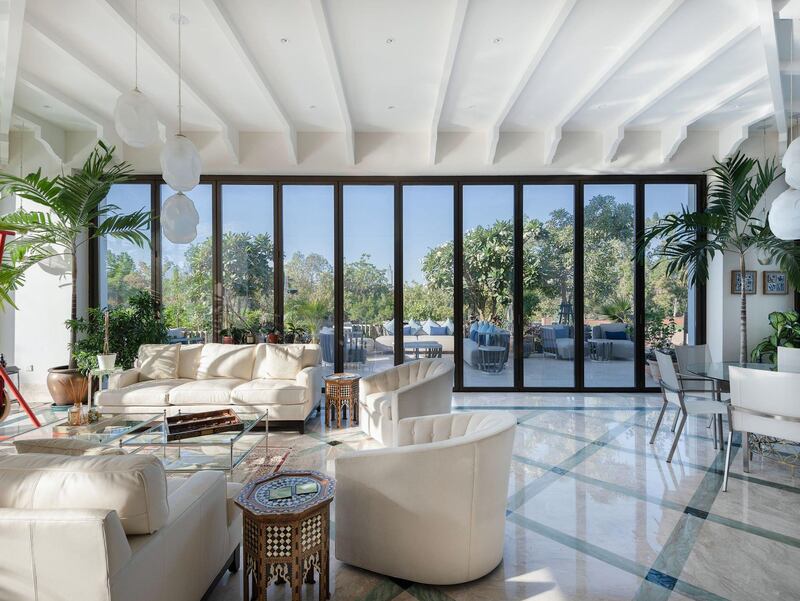 Floor-to-ceiling windows ensure plenty of light. Courtesy Luxhabitat Sotheby's International Realty