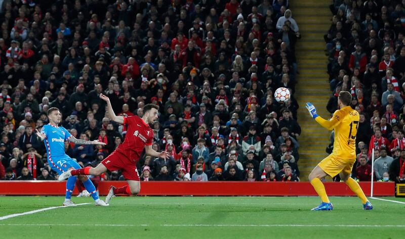 Liverpool's Diogo Jota scores their first goal. Reuters