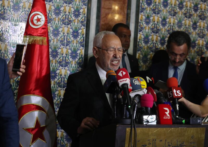 epa08574732 Tunisian Parliament Speaker Rached Ghannouchi (L) speaks at a press conference following a plenary session at the Assembly of the People's Representatives (ARP) in Tunis, Tunisia, 31 July 2020. Rached Ghannouchi, leader of the Ennahdha party, retained his seat as Speaker of Parliament, after the vote to withdraw confidence following the motion filed against him by four parliamentary blocs.  EPA/MOHAMED MESSARA