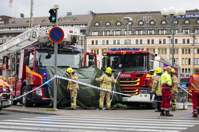 Rescue personnel cordon the place where several people were stabbed, at Turku Market Square. Roni Lehti / Lehtikuva via Reuters.