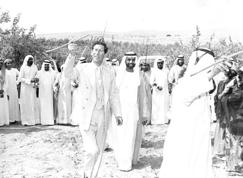 HRH The Prince of Wales and HE Shaikh Nahayan bin Mubarak Al Nahyan participating in traditional dancing during HRH's visit to the UAE in 1988. (Courtesy Al Ittihad)