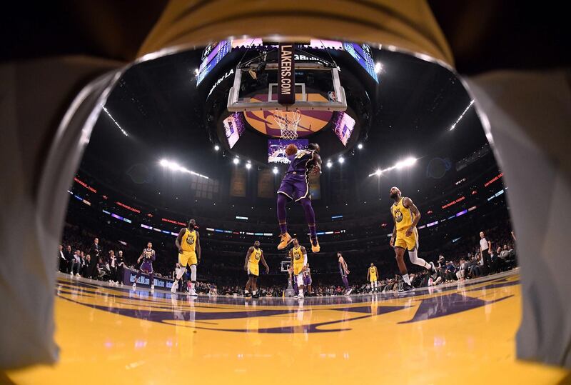 LeBron James of the Los Angeles Lakers scores against Golden State Warriors in their NBA match at the Staples Centre on Wednesday, November 13, 2019. AFP